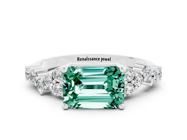 Silver Emerald Cut Green Sapphire Scattered Round Accent Ring with Prong Setting
