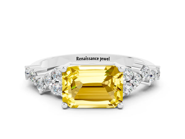 Platinum Emerald Cut Yellow Sapphire Scattered Round Accent Ring with Prong Setting