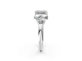 White gold Emerald Cut Diamond Cluster Ring with Round Accent Stones and Prong Setting on a Classic Band_80