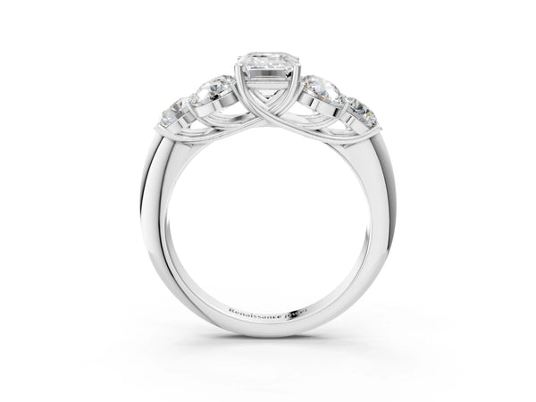 White gold Emerald Cut Diamond Cluster Ring with Round Accent Stones and Prong Setting on a Classic Band