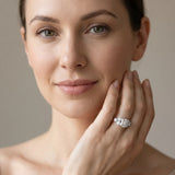 White gold Emerald Cut Diamond Cluster Ring with Round Accent Stones and Prong Setting on a Classic Band_91