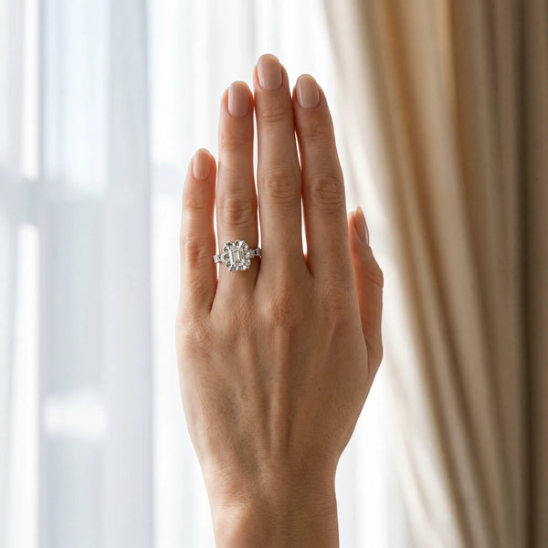 White gold Emerald Cut Diamond Floral Halo Engagement Ring with Shared Prong Setting
