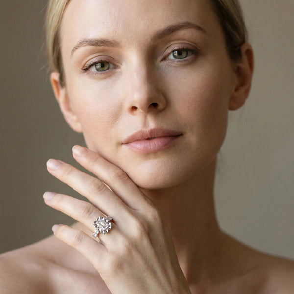 White gold Emerald Cut Diamond Floral Halo Engagement Ring with Shared Prong Setting