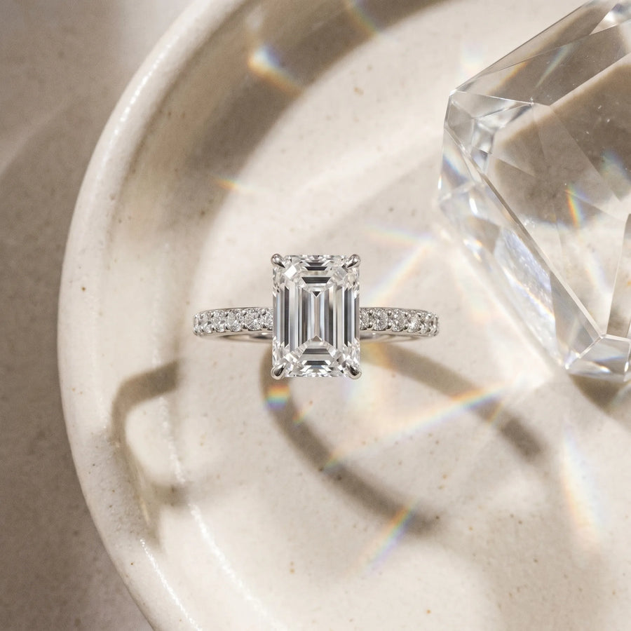 White gold Emerald Cut Diamond Pavé Band Ring with Four-Prong Setting