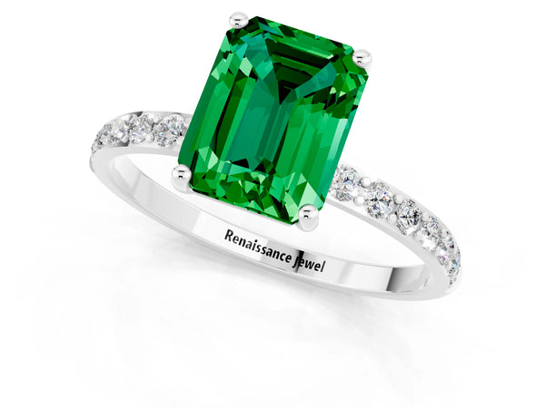 White gold Emerald Cut Emerald Solitaire Ring with Round Pavé Shoulders and Prong Setting