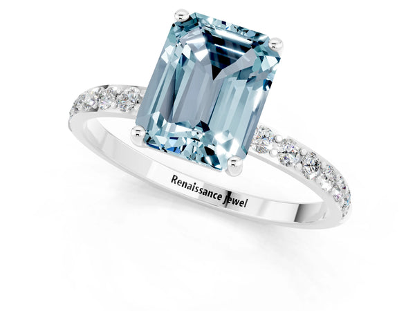 Platinum Emerald Cut Aquamarine Solitaire Ring with Round Pavé Shoulders and Prong Setting