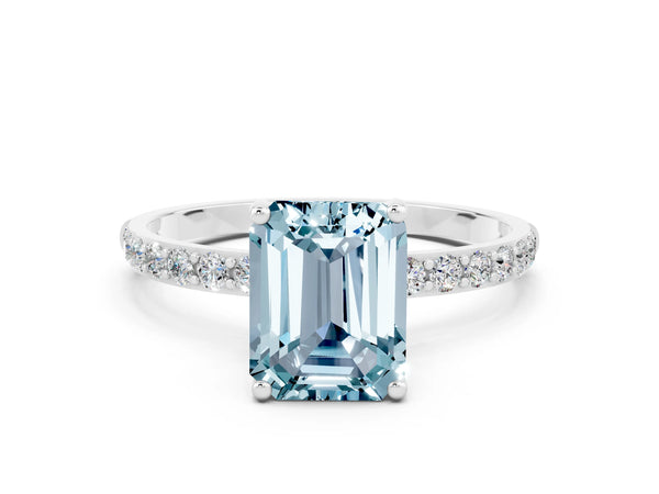 Platinum Emerald Cut Aquamarine Solitaire Ring with Round Pavé Shoulders and Prong Setting