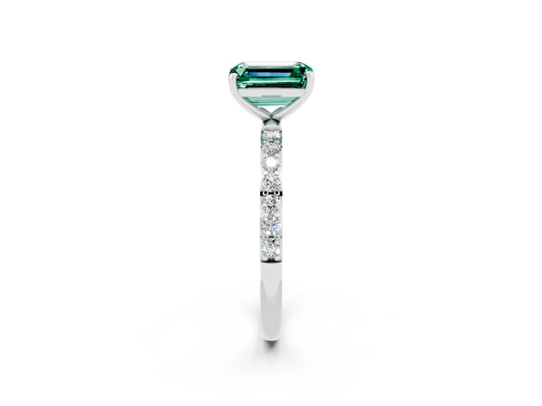 Platinum Emerald Cut Green Sapphire Solitaire Ring with Round Pavé Shoulders and Prong Setting