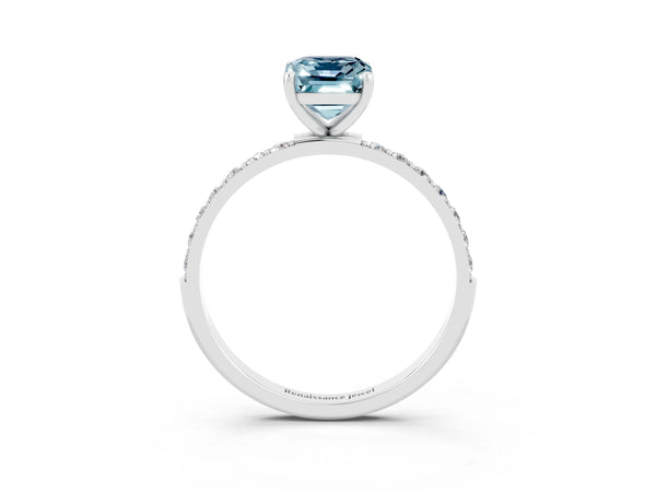 Silver Emerald Cut Aquamarine Solitaire Ring with Round Pavé Shoulders and Prong Setting