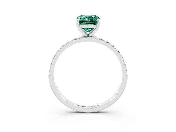 Platinum Emerald Cut Green Sapphire Solitaire Ring with Round Pavé Shoulders and Prong Setting
