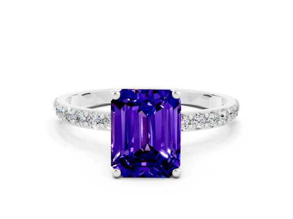 White gold Emerald Cut Tanzanite Solitaire Ring with Round Pavé Shoulders and Prong Setting