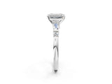 White gold Emerald Cut Diamond Ring with Baguette Side Stones, Channel Set Band, and Four-Prong Setting_39