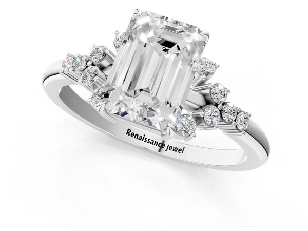 White gold Emerald Cut Diamond Ring with Side Stones and Four-Prong Setting