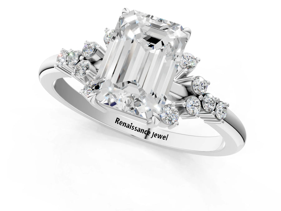 White gold Emerald Cut Diamond Ring with Side Stones and Four-Prong Setting