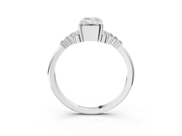 White gold Emerald Cut Diamond Ring with Side Stones and Four-Prong Setting