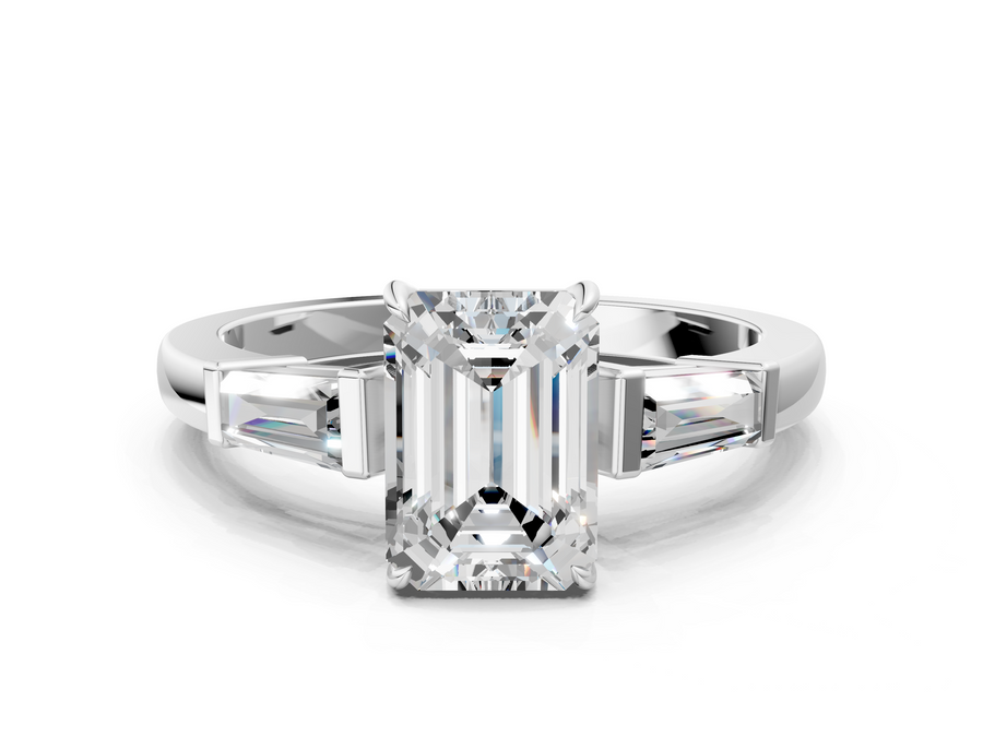 White gold Emerald Cut Diamond Ring with Tapered Baguette Side Stones in Four-Prong Setting