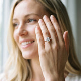 White gold Emerald Cut Diamond Ring with Tapered Baguette Side Stones in Four-Prong Setting_51