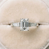 White gold Emerald Cut Diamond Ring with Tapered Baguette Side Stones in Four-Prong Setting_52