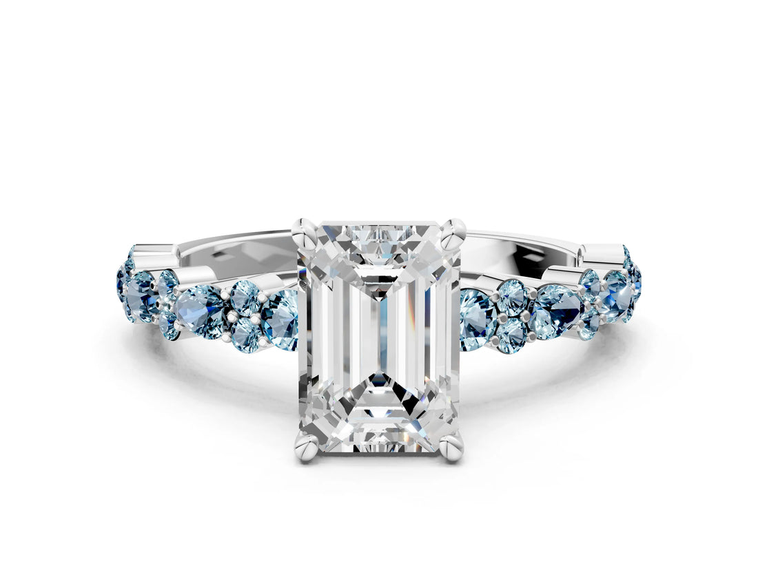White gold Emerald Cut Diamond Side Stone Solitaire Ring with Round with Aquamarine side stone and Four-Prong Setting