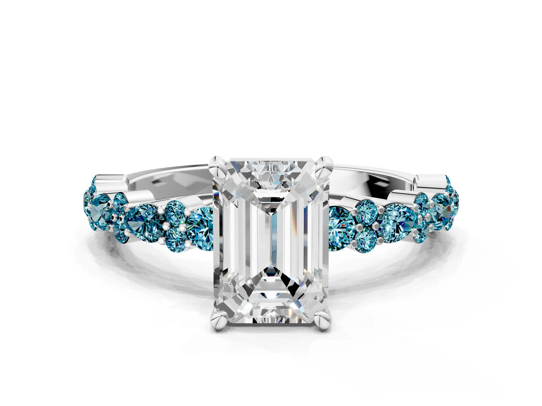 White gold Emerald Cut Diamond Side Stone Solitaire Ring with Round with Blue Topaz side stone and Four-Prong Setting