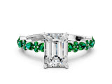 White gold Emerald Cut Diamond Side Stone Solitaire Ring with Round with Emerald side stone and Four-Prong Setting