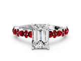 White gold Emerald Cut Diamond Side Stone Solitaire Ring with Round with Ruby side stone and Four-Prong Setting