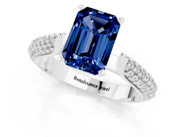 Silver Emerald Cut Blue Sapphire Solitaire Engagement Ring with Multi-Row Round Pavé Band and Prong Setting
