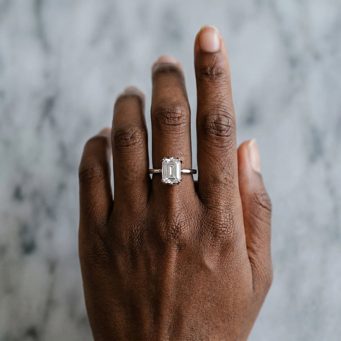 White gold Emerald Cut Diamond Solitaire Ring with Flower Prong Setting and Classic Band_310