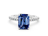White gold Emerald Cut Diamond Solitaire Ring with Four-Prong Setting and Pavé Band
