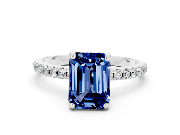 White gold Emerald Cut Blue Sapphire Hidden Halo Engagement Ring with Round Pavé Band and Prong Setting