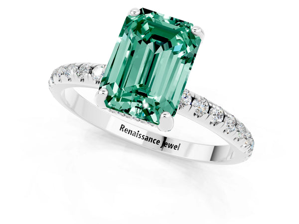 Platinum Emerald Cut Green Sapphire Hidden Halo Engagement Ring with Round Pavé Band and Prong Setting