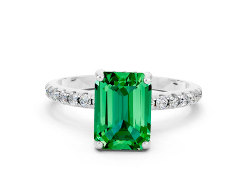 White gold Emerald Cut Diamond Solitaire Ring with Four-Prong Setting and Pavé Band