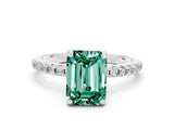 White gold Emerald Cut Diamond Solitaire Ring with Four-Prong Setting and Pavé Band