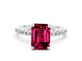 White gold Emerald Cut Diamond Solitaire Ring with Four-Prong Setting and Pavé Band
