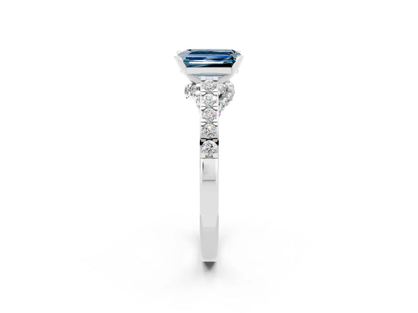 Platinum Emerald Cut Aquamarine Solitaire Ring with Crossover Gallery and Round  Pavé Band