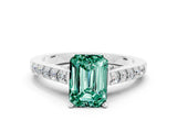 White gold Emerald Cut Diamond Solitaire Ring with Pavé Band and Prong Setting