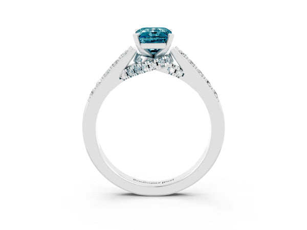 Platinum Emerald Cut Blue Topaz Solitaire Ring with Crossover Gallery and Round  Pavé Band