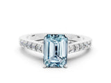 White gold Emerald Cut Diamond Solitaire Ring with Pavé Band and Prong Setting