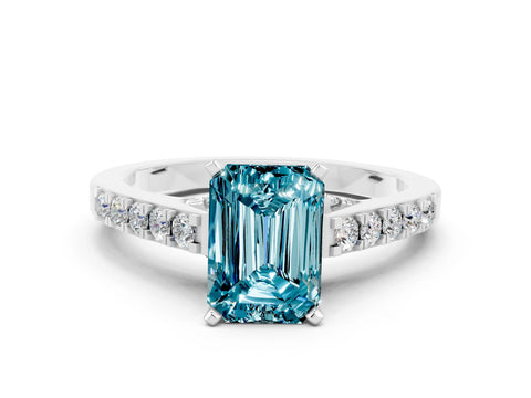 White gold Emerald Cut Diamond Solitaire Ring with Pavé Band and Prong Setting
