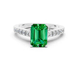 White gold Emerald Cut Diamond Solitaire Ring with Pavé Band and Prong Setting