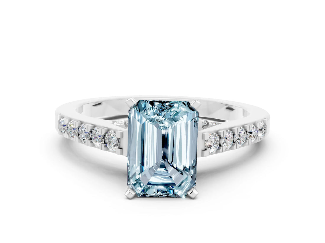 White gold Emerald Cut Diamond Solitaire Ring with Pavé Band and Prong Setting
