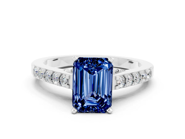 Platinum Emerald Cut Blue Sapphire Solitaire Ring with Crossover Gallery and Round  Pavé Band