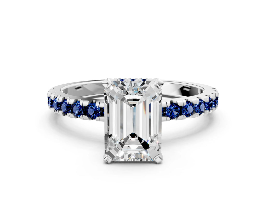 White gold Emerald Cut Diamond Solitaire Ring with Round with Blue Sapphire side stone Pavé Band and Four-Prong Setting_36