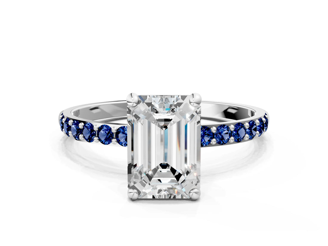 White gold Emerald Cut Diamond Solitaire Ring with Round with Blue Sapphire side stone Pavé Band and Prong Setting_12