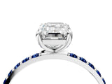 White gold Emerald Cut Diamond Solitaire Ring with Round with Blue Sapphire side stone Pavé Band and Prong Setting_28