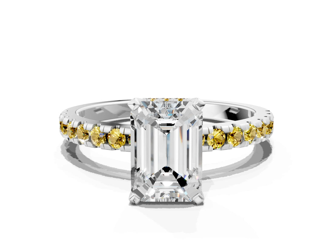 White gold Emerald Cut Diamond Solitaire Ring with Round with Yellow Sapphire side stone Pavé Band and Four-Prong Setting
