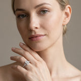 White gold Emerald Cut Diamond Solitaire Ring with Side Stones and Four-Prong Setting_423