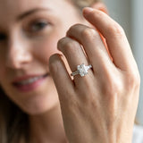 White gold Emerald Cut Diamond Solitaire Ring with Tapered Baguette Accents and Four-Prong Setting_157