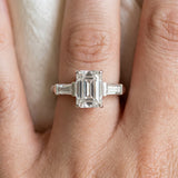 White gold Emerald Cut Diamond Solitaire Ring with Tapered Baguette Accents and Four-Prong Setting_158