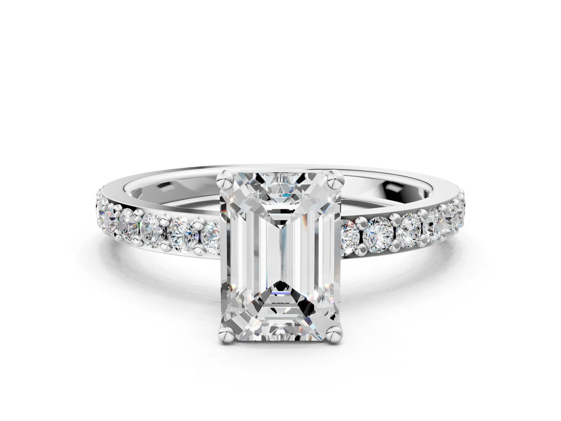 White gold Emerald Cut Diamond Solitaire with Pave Band and Four-Prong Setting
